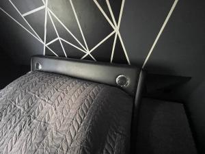 Posteľ alebo postele v izbe v ubytovaní Apartamenty Konopnicka