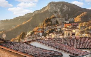 a view of a town with a mountain in the background at Cozy Home In Cardoso-gallicano Lu With Kitchen in Cardoso