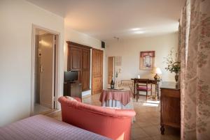 TV a/nebo společenská místnost v ubytování Hotel Umbra