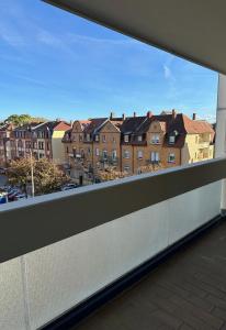 einen Blick vom Balkon eines Gebäudes in der Unterkunft Nice, big and central apartment with 2 balconies in Karlsruhe