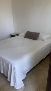 Postel nebo postele na pokoji v ubytování Hotel fresno Xochitepec + 12 fotografií