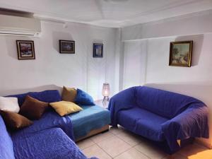 A seating area at Art apartment Syngrou