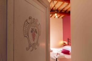 A bed or beds in a room at Torre della Botonta