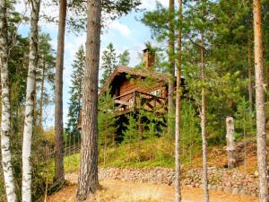 a tree house in the middle of the forest at Holiday home MORA in Börka