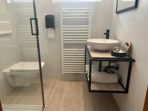 Koupelna v ubytování Hotel Bajt Maribor