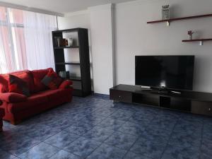 A television and/or entertainment centre at 110 square meters, 5 min of all-Best area of Las Palmas