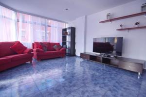A television and/or entertainment centre at 110 square meters, 5 min of all-Best area of Las Palmas