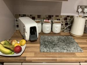 Kuchyň nebo kuchyňský kout v ubytování The Anfield Apartment