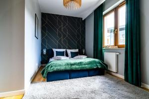 Posteľ alebo postele v izbe v ubytovaní ApartamentySnu, Słoneczny Komfort, Centrum
