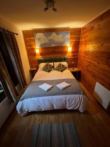 Postel nebo postele na pokoji v ubytování Hotel Andes Pucón