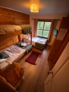 Postel nebo postele na pokoji v ubytování Hotel Andes Pucón