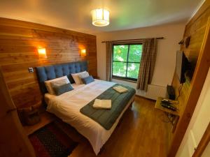 Postel nebo postele na pokoji v ubytování Hotel Andes Pucón