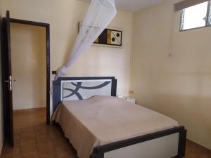Postel nebo postele na pokoji v ubytování Chambres d'hôte Sud Basse-Terre