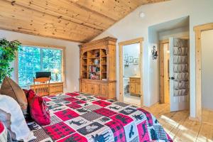 a bedroom with a bed and a wooden ceiling at Arnold Cabin with EV Charger, Fire Pit and Hikes! in Arnold