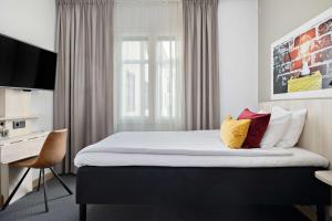 Postel nebo postele na pokoji v ubytování Best Western Hotel Svava