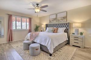 a bedroom with a bed and a ceiling fan at Stunning Sun Lakes Retreat Less Than 1 Mi to Golfing! in Sun Lakes +25 photos