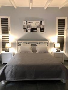 מיטה או מיטות בחדר ב-Villa le Moulin - Didier BERVILLE