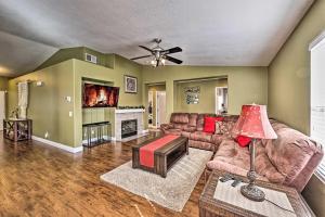 a living room with a couch and a table at Incredible Wildomar Getaway with Outdoor Oasis! in Wildomar