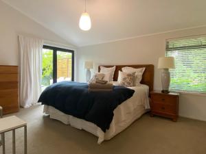 Postel nebo postele na pokoji v ubytování Beluga - Self contained accomodation Kerikeri