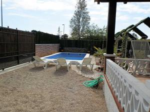Bazén v ubytovaní Vacaciones ideales: Casa cerca del mar con piscina privada, wifi, aire opcional y mascotas bienvenidas - ES-184-34 alebo v jeho blízkosti