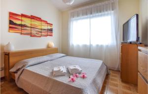 Postel nebo postele na pokoji v ubytování Awesome Apartment In Recanati With 1 Bedrooms