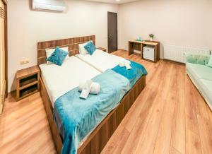 Postel nebo postele na pokoji v ubytování Hotel Classic Suites