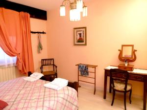 Ένα ή περισσότερα κρεβάτια σε δωμάτιο στο B&B Gli Eremiti