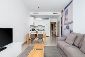 TV a/nebo společenská místnost v ubytování Suites Del Pintor