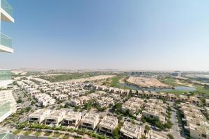 an aerial view of an apartment complex at Immaculate 1BR apartment at Carson C in Dubai