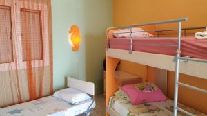 Postel nebo postele na pokoji v ubytování Ioannis House Sea View-Perfect family holidays