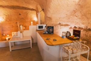 Kuchyň nebo kuchyňský kout v ubytování Sassi -Suite InLapis - Casa Nella Pietra