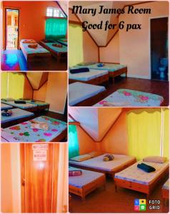 Rúm í herbergi á TRIPLE JS INN-SAGADA