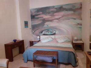 Rúm í herbergi á Charming B&B Dar Ta Zeppi