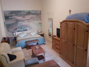 TV a/nebo společenská místnost v ubytování Charming B&B Dar Ta Zeppi