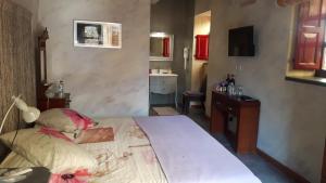Rúm í herbergi á Charming B&B Dar Ta Zeppi