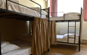 Postel nebo postele na pokoji v ubytování Wine Hostel