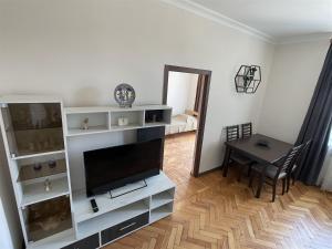 A television and/or entertainment centre at apartment called CASCADE