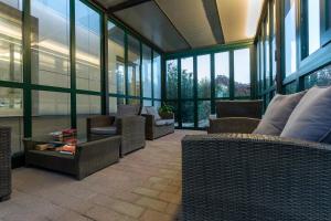 Posezení v ubytování Hotel La Quercia