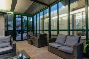 Posezení v ubytování Hotel La Quercia