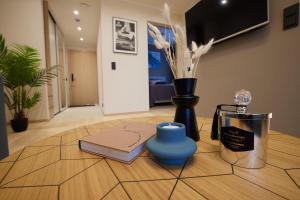 TV a/nebo společenská místnost v ubytování Kastani Apartments
