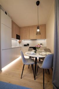Kuchyň nebo kuchyňský kout v ubytování Kastani Apartments