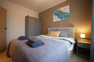 Postel nebo postele na pokoji v ubytování Kastani Apartments