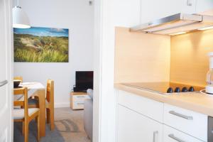 Kuchyň nebo kuchyňský kout v ubytování Ferienhaus Pauls Ferienhaus Pauls, Whg 09 + 2 fotografie