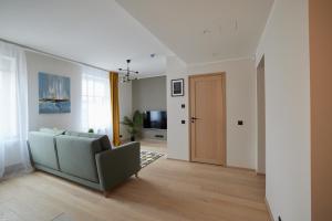 TV a/nebo společenská místnost v ubytování Kastani Apartments