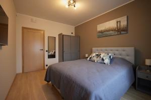 Postel nebo postele na pokoji v ubytování Kastani Apartments