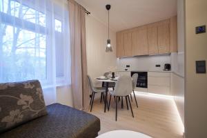 Kuchyň nebo kuchyňský kout v ubytování Kastani Apartments