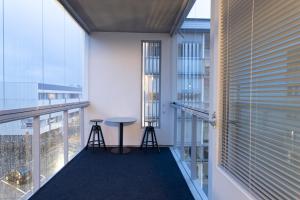Balkón nebo terasa v ubytování Arctic City Apartment Tammela with sauna and free parking