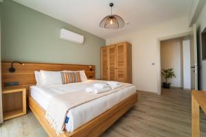 Postel nebo postele na pokoji v ubytování Ansira Fethiye
