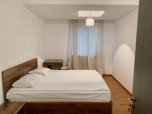 Postel nebo postele na pokoji v ubytování One Day Hostel