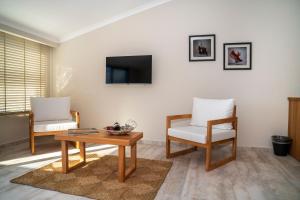 TV a/nebo společenská místnost v ubytování Ansira Fethiye